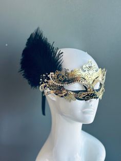 The set includes a striking gold and black mask for him and a captivating gold and black mask for her. The women's mask features a dramatic black feather, adding a touch of allure and mystique to her look. Whether you're attending a grand masquerade ball or a themed gala, this mask set ensures you'll be the center of attention.


Age Group/Gender - Adult/Unisex

Size/Type - One size fits all adults

Mask Color - Gold/Black

Mask Material - Polyresin

Special Features - Black feathers on the wome Couples Masquerade Masks, Gold Masquerade Mask, Black Masquerade Mask, Feather Mask, Female Mask, Gold Mask, Venetian Masks, 1920s Flapper, Type One