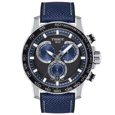 From Tissot's T-Sport collection, the Supersport Chrono is a masculine, dynamic and futuristic watch, which offers a wide range of references, giving everyone the possibility to pick the watch which fits best to their wrist. This model fastens with an interchangeable quick-release blue and black embossed textile leather strap with a TISSU back and a standard buckle. The black chronograph dial exhibits a date window at 6 o'clock and SuperLuminova(R) accents for easy readability at night or in dim Tissot Chronograph, Futuristic Watches, Chrono Watches, Tissot Watches, Mens Chronograph, Chronograph Watch Men, Super Sport, Blue Accents, Zeppelin