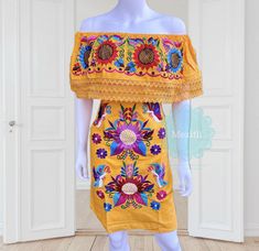 "Lace Trim Off the shoulder tie back Mexican dress with butterfly and sunflower embroidery. Made out of manta, 100% cotton. Color:Blue Small/Medium Bust- 42\" Hips- 44\" Waist- 44\" Length- 34\" Large Bust- 48\" Hips- 48\" Waist- 48\" Length- 38\" X-Large Bust- 52\" Hips- 52\" Waist- 52\" Length- 38\" 🧵Made in Chiapas, Mexico. 🧺Care Instructions: We recommend hand washing, lay flat to dry. 📲Please feel free to message me with any questions regarding sizing and fit. 📷Additional photos can be Yellow Folk Dress For Spring, Fitted Yellow Bohemian Embroidered Dress, Traditional Yellow Embroidered Summer Dress, Yellow Embroidered Summer Dress, Bohemian Embroidered Off-shoulder Summer Dress, Traditional Yellow Embroidered Dress For Summer, Bohemian Off-shoulder Embroidered Summer Dress, Yellow Summer Embroidered Dress, Yellow Embroidered Folk Dress