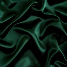 Hunter bridal satin fabric offers a beautiful smooth medium weight 100% polyester shiny satin material and popular for wedding dresses, gowns, apparel, fashion, and event decor. Bridal satin is an affordable option for table linens, draperies, chair covers, sashes, napkins, embroidered fabric, fashion, children's wear, crafts, and much more. Sold wholesale in a 70 yard roll. Color can vary by dye lot or batch. Emerald Green Swatch, Dark Green Eucalyptus, Evergreen Color Aesthetic, Green Silk Aesthetic, Satin Colors Fabric, Color Asethic, Hunter Green Aesthetic, Dark Green Vibes, Pray Artwork