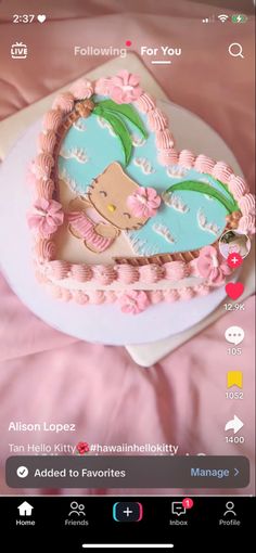 a heart shaped cake sitting on top of a white plate