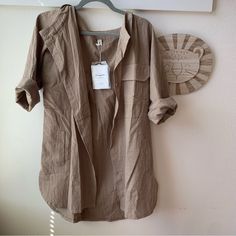 Boho Tunic. New With A Tag. Size M New To Poshmark? Sign Up With The Code Bstworld For $10 Off Your First Order Neutral Long Sleeve Top For Summer, Casual Neutral Blouse For Day Out, Beige Relaxed Fit Summer Blouse, Neutral Relaxed Fit Tops For Spring, Spring Neutral Relaxed Fit Tops, Relaxed Fit Khaki Shirt For Beach, Summer Long Sleeve Tops With Pockets, Neutral Tops With Pockets For Day Out, Long Sleeve Neutral Tops For Vacation