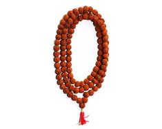 Fine quality hand knoted five face Nepali Rudraksha seed Buddhist prayer mala. Hand strung with red tassel, made in our Namaste Beads Handicrafts workshop in Kathmandu, Nepal. Beads : 108 Size : 8mm Weight : 36g Length : 20 inch We use a strong cord in different colors. If you need an specific color on your string, just inform us and we will be glad to made it. Red Mala For Meditation With Round Beads, Red Mala With Round Beads For Meditation, Red Round Beads Mala For Meditation, Red 8mm Beads Spiritual Mala, Red Mala With 108 Beads For Puja, Hand-strung Red Mala As A Gift, Red Mala For Meditation, Red Hand-strung Mala For Festivals, Red Hand-strung Mala As Gift