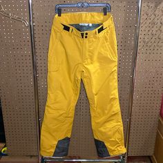 Yellow Medium Ski Pants Never Worn Or Used Unless Otherwise Stated All Items Are Pre Owned. Please View All Photos As Part Of The Description. Any Obvious Defects Or Call Outs Will Be Described And Photographed. Please Note Color May Not Be Exact Due To Lightening Or Differences In Monitors, Phones And Screens. All Items Measurements Are Taken On A Flat Surface And Are Approximate. Everything Shipped Daily From The North Pole, Alaska Post Office. All Items Come From A Non-Smoking And Animal (Dog Full-length Ski Bottoms For Ski Season, Full Length Skiing Bottoms For Ski Season, Yellow Bottoms With Pockets For Outdoor, Yellow Winter Bottoms With Pockets, Yellow Bottoms With Pockets For Winter, Casual Full Length Pants For Winter Sports, Casual Full-length Pants For Ski Season, Casual Full-length Skiing Bottoms, Full Length Pants For Ski Season