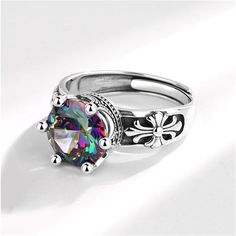 Silver-plated ring with a sparkling crystal centerpiece. Face: 0.43" H Silver-plated copper / crystal Metal Crystal Promise Ring, Crystal Centerpieces, Copper Crystal, Romantic Gestures, Crown Design, Sparkling Rings, Crown Ring, Purple Crystal, Round Rings