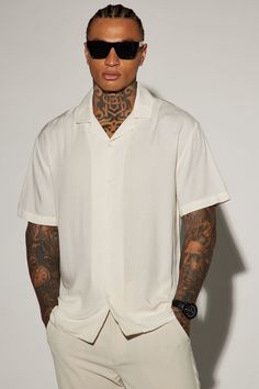 Available In Off White, Purple, And Pink. Model Height: 6'2 - Wearing Large Big & Tall: Height 6'3 - Wearing XXXL Short Sleeve Fold Down Collar Button Front 100% Viscose Imported California Proposition 65 WARNING: Cancer and Reproductive Harm - www.P65Warnings.ca.gov. | Mens Dawson Short Sleeve Woven Top in Off White size 2XL by Fashion Nova Night Club Outfits Men, Mens Prom Outfit, Club Outfits Men, Club Outfit Night, Prom For Guys, Party Outfit Men, Rehearsal Dinner Outfits, Off White Fashion, Cuban Shirts