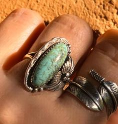 🌵🐴This is a lovely Old Pawn Navajo Sterling Silver Turquoise Signed Ring,  size 8.75. Looks even better in person. It features a great minty green cab and stamping all the way around. I especially love this chunky oval cab and the sterling applique leaf flanking one side. A lot of work went into the creation of this awesome ring.  🌵🐴This ring is comfortable to wear and is on the daintier side - perfect for all the cowgirls who prefer a ring for any occasion and activity! From the barn to the boardroom! 1 1/8" by 3/4"! Ca. 1960s. Vintage turquoise ring only! Old Pawn Turquoise Jewelry, Unique Green Turquoise Ring, Untreated Turquoise Ring, Southwestern Style Green Turquoise Ring As Gift, Bohemian Turquoise Gemstone Ring, Untreated Bohemian Turquoise Ring, Bohemian Green Turquoise Gemstone Ring, Green Turquoise Ring With Patina In Sterling Silver, Handmade Southwestern Green Rings