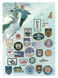 an image of a man skiing on the slopes with many patches and stickers around him