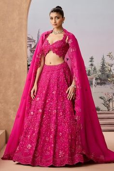 Magenta can can attached lehenga featuring tonal thread embroidered rosette vine motifs highlighted by sequins and bead embellishments. Comes with cut-out border embroidered padded blouse and dupatta. - Aza Fashions Fitted Pink Sets For Ceremony, Fitted Organza Choli For Ceremonies, Pink Lehenga With Lace Work And Traditional Drape, Traditional Pink Lehenga With Lace Work, Fitted Lehenga With Lace Work For Festive Occasions, Fitted Wedding Lehenga With Lace Work, Elegant Pink Choli For Ceremony, Fitted Sets With Sheer Dupatta For Ceremony, Pink Ceremony Dupatta