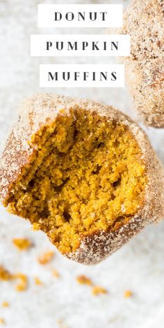 two pumpkin muffins are cut in half and stacked on top of each other