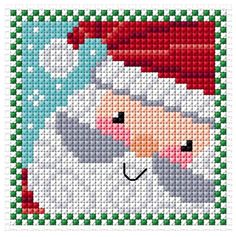 a cross stitch christmas card with a santa clause on it