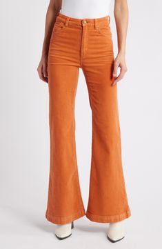 Rock a retro vibe in stretch-kissed corduroy pants fashioned with fabulously flared legs. Zip fly with button closure Five-pocket style 99% cotton, 1% elastane Machine wash, line dry Imported Pants Nordstrom, Orange Pants, Rock A, Nordstrom Store, Fabric Gifts, Free Fabric, Retro Vibe, Corduroy Pants, East Coast