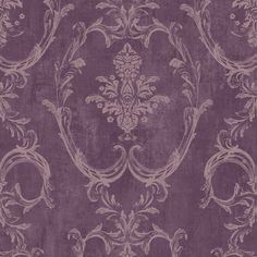 a purple wallpaper with an ornate design on it