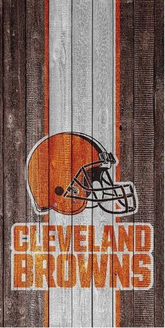 the cleveland browns logo is painted on an old wooden fence