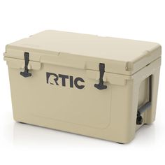 a beige cooler with the rtic logo on it's side and two black handles