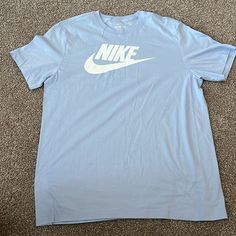 Nike Men’s T-Shirt Light Blue With White Logo Size L New Without Tags Light Blue Logo Print Crew Neck T-shirt, Light Blue Crew Neck T-shirt With Logo, Casual Light Blue T-shirt With Logo Print, Nike Blue Crew Neck T-shirt, Casual Light Blue T-shirt With Logo, Nike Light Blue Crew Neck T-shirt, Blue Nike T-shirt With Logo Print, Nike Blue T-shirt With Logo Print, Nike Light Blue Cotton Tops