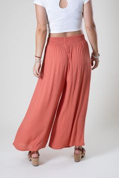 These soft and stylish crepe pants are back and better than ever. Fun and floaty with a touch of stretch and a versatile waistband that can be folded up or down for that perfect fit. Coupled with a groovy wide leg, these lightweight full-length pants are the perfect bottoms for any bohemian goddess or fashion-forward funky female.