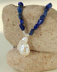 Metal: 18ct Gold Plated on Brass
Gemstone: Lapis, Freshwater Pearl，
Length: 400mm+50mm(15.7”+ 2”)
Weight: 25g Pearl Gemstone, Pearl Pendant Necklace, Gemstone Bracelets, Bracelet Stack, Pearl Ring, Pearl Pendant, Charm Earrings, Pearl Bracelet, Gemstone Necklace