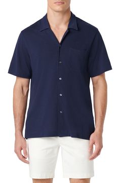 Crafted for comfort in a soft, stretchy knit, this short-sleeve button-up features a notched collar and a handy chest pocket. 30 1/2" length; 44" chest Front button closure Notched collar Short sleeves Chest patch pocket 62% polyester, 33% cotton, 5% spandex Machine wash, dry flat Imported Navy Polo Collar Shirt For Summer, Navy Casual Short Sleeve Shirt With Pockets, Navy Short Sleeve Polo Shirt For Spring, Fitted Polo Shirt With Pockets For Summer, Summer Collared Polo Shirt With Button Closure, Classic Short Sleeve Shirt With Pockets, Classic Short Sleeve Collared Shirt With Pockets, Collared Camp Shirt With Pockets, Classic Collared Short Sleeve Shirt With Pockets