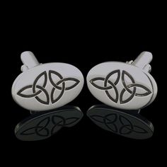 ☘️Description These cufflinks are beautifully detailed with a double Trinity Knot inscription. They are made from the finest Sterling Silver with a highly polished finish. ☘️About the Design Celtic Knots date back to the 7th Century; they are a pattern of interlaced unbroken lines with no beginning or end and as such believed to denote faith, declare love and unity and protect against evil. They are also believed to represent infinity and eternity due to the continuous unbroken nature of the des Celtic Knot Sterling Silver Cufflinks, Dublin Castle, Trinity Knot, Irish Jewelry, Celtic Knots, Tie Tack, Silver Cufflinks, Dublin Ireland, Tie Accessories