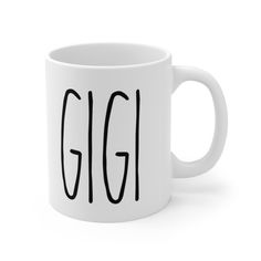 a white coffee mug with the word gig on it's front and back sides