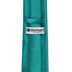 This is the tie to add to your jewel-tone wedding. The blue-green shade will stand out with modern gray or navy blue groomsmen suits. Or, pair it with black suits for a more traditional feel. If you want to mix and match tie styles among your wedding party, it's easy to do with this color. It also comes in skinnier widths and bow ties. This tie is part of our premium collection, so it's made from thicker, heavyweight material. It's finished with an elegant sheen that's not too shiny or too dull. Classic Multicolor Ties For Semi-formal Occasions, Navy Blue Groomsmen, Blue Groomsmen Suits, Blue Groomsmen, Luxury Classic Multicolor Ties, Luxury Multicolor Standard Tie, Jewel Tone Wedding, Groomsmen Suits, Tie Styles