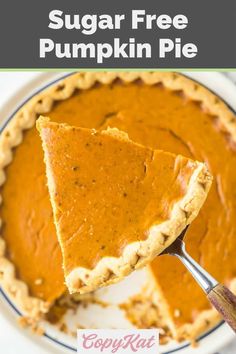 a slice of pumpkin pie on a plate with the text overlay that reads sugar free pumpkin pie