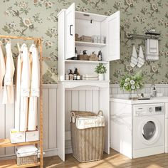 a washer and dryer in a room with floral wallpaper on the walls