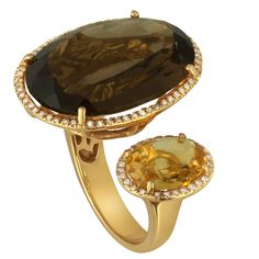 The stones are set in 14K Yellow Gold The ring has a large Smoky Quartz 17.60ct It also has a Citrine 2.15ct. These beautiful stones are surrounded by diamonds 0.26ct. The ring is a size 6.75 The ring weighs 10.8 grams Smoky Quartz Jewelry, Flower Diamond Ring, Jewellery Photography, Gold Flower Ring, Smoky Quartz Ring, Vintage Cocktail Ring, Gold Cocktail Ring, Top Rings, Gold Cocktail