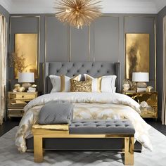 a bedroom with gold accents and gray walls