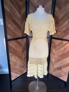 Fabulous 1930's butter yellow crochet flutter sleeve dress with drawstring waist. Very very good vintage condition, but has two fait pink spots on the booty.  Women's medium Measurements coming Fitted Yellow Crochet Dress For Spring, Vintage Crochet Dress For Spring, Vintage Fitted Crochet Dress With Lace Trim, Fitted Vintage Crochet Lace Dress, Fitted Vintage Crochet Dress With Lace Trim, Fitted Crochet Dress For Summer Daywear, Vintage Fitted Crochet Dress For Spring, Fitted Retro Crochet Dress For Spring, Fitted Crochet Dress With Short Sleeves For Vacation