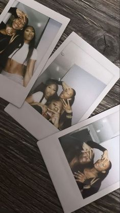 four polaroid photos of three women and one man posing for the camera on a wooden table