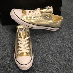 New With Tags. Light Gold Casual High-top Metallic Sneakers, Casual Metallic Sneakers With Perforated Toe Box, Casual Gold Sneakers With Round Toe, Casual Gold Lace-up Sneakers, Casual Metallic Leather Sneakers, Gold Low-top Sneakers For Spring, Gold Low-top Casual Sneakers, Casual Gold Sneakers, Casual Metallic Sneakers With Round Toe