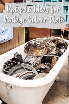 an old bath tub filled with lots of junk