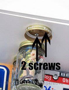 two screws on top of a mason jar with money in it and the bottom labeled 2 screws