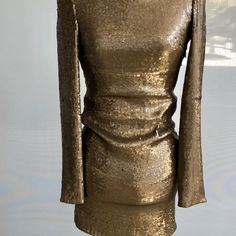 Stunning Bronze Silk Sequin Dress. Form Fitting But Has A Comfortable Spandex Stretch. Elegant Stretch Sequin Evening Dress, Fitted Luxury Sequin Dress, Luxury Fitted Sequin Party Dress, Fitted Gold Mini Dress For Formal Occasions, Fitted Gold Dress With Long Sleeves, Elegant Sequin Stretch Mini Dress, Elegant Stretch Mini Dress With Sequins, Luxury Fitted Sequin Dress For Formal Occasions, Luxury Fitted Sequin Formal Dress