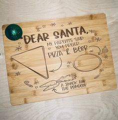 a wooden cutting board with some writing on it that says dear santa, my parents said you prefer pizza & beer