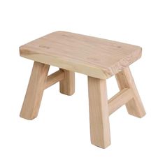 a small wooden stool on a white background