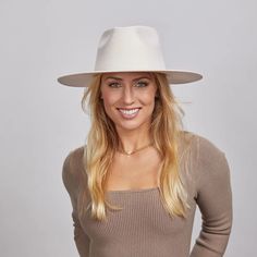 Rancher Vivid | Womens Colored Felt Fedora Hat is perfect for women who want to make a bold statement. Crafted from wool felt with a wide brim, its vibrant colors and sleek design add a pop of style to any look. Material: Wool Felt Shape: Tear Drop Western Trim: No Trim Brim size: 3 1/2" Crown height: 4 1/8" Sweatband: Adjustable Velcro Sweatband Imported Straw Cowgirl Hat, White Cowboy Hat, Brown Cowboy Hat, Hats For Big Heads, American Hat Makers, Leather Cowboy Hats, Black Cowboy Hat, Outback Hat, Black Cowgirl