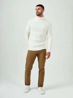 A classic turtleneck sweater crafted from a buttery-soft 4-way stretch fabric. Layer with your favorite pieces for optimal warmth during colder days. Details Model is 6'1" and wears a size medium. Care: Machine wash cold with similar colors on delicate cycle. Do not bleach. Do not tumble dry. Iron on low. Dry flat. Do not dry clean. Composition: 52% Viscose | 26% Polyester | 22% Nylon Classic Turtleneck, Ivory Sweater, Sweater Layering, 4 Way Stretch Fabric, Twin Cities, Chunky Knits Sweater, Zip Sweater, Cold Day, Lifestyle Brands