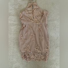 Beige Halter Style Dress Sequin Embroidery Open Back, Lace-Up Strappy Design, Tie Closure Sheer Mesh Fabric, Full Knit Lining Beige Sequined Sleeveless Mini Dress, Sleeveless Beige Mini Dress With Sequins, Beige Sleeveless Sequin Mini Dress, Beige Sleeveless Mini Dress With Sequins, Beige Party Dresses With Floral Embroidery, Elegant Beige Mini Dress With Floral Embroidery, Beige Embroidered Party Dress, White Sparkle Dress, Backless Evening Gowns