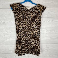 Torn By Ronny Kobo Leopard Print Blouse Nwt Size Large. All Measurements Are Approximate. Chest:15” Length:27/29.5” (Front/Back) Fitted Leopard Print Blouse With Short Sleeves, Elegant Leopard Print Blouse For Summer, Chic Short Sleeve Leopard Print Blouse, Summer Fitted Leopard Print Blouse, Fitted Leopard Print Summer Blouse, Fitted Leopard Print Blouse For Summer, White Bell Sleeve Top, Long Sleeve Peplum Top, Bell Sleeve Crop Top