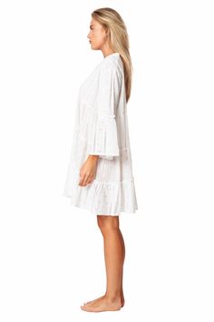 Camella Casual Mini Dress by La Moda. Just as effortless as it is essential, this stunning mini dress is featured in a tiered relaxed body with exaggerated sleeves. The perfect throw-on-and-go mini to pair with a staple sandal in the warmer months or a bold boot in the colder, this cool and classic dress is sure to be your go-to from season to season. 100% Cotton This is a unique garment. The imperfections in these fabrics are not considered defects, but characteristics that make them authentic. Flowy Ruffle Sleeve Tiered Vacation Dress, Flowy Tiered Dress With Ruffle Sleeves For Vacation, Ruffle Sleeve Tiered Dress For Vacation, Tiered Ruffle Sleeve Dress For Vacation, Vacation Tiered Dress With Ruffle Details, Vacation Mini Dress With Ruffle Sleeves, Bell Sleeve Ruffled Dresses For Vacation, Long Sleeve Tiered Dress With Ruffle Hem For Summer, Flowy Tiered Dress With Ruffle Sleeves For Summer