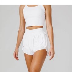 Acta Women High Waisted Shorts W/ Liner Color White Size Small White High-waisted Athletic Shorts With Built-in Shorts, Athleisure Shorts For Summer Day Out, Athleisure Shorts For Day Out In Summer, Summer Athleisure Shorts For Day Out, White Stretch Athletic Shorts With Short Inseam, White Activewear With Built-in Shorts For Summer, Summer Activewear With Short Inseam In Solid Color, Summer Activewear With Solid Color And Short Inseam, Chic Workout Shorts For Spring