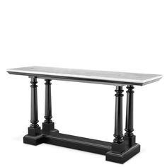 a white marble top table with black columns