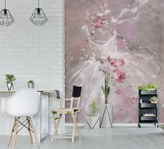 a living room with white brick walls and an abstract painting on the wall