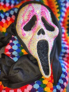 a colorful cloth with a mask on it