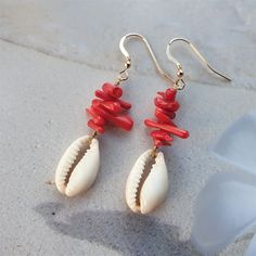 Beautiful cowrie shell earrings with red coral chips are beachy coral earrings, ocean earrings or red coral earrings- made of 6-15mm bamboo chip beads and a cowrie shell bead. These coral beads are made of bamboo. Bamboo is a whitish marine plant, dyed to imitate coral. Coral is the absolute summer stone and color and it is a perfect sea inspired jewelry, coral jewelry,shell jewelry, cowrie jewelry, beach jewelry or summer jewelry. Perfect gift for her or beachlover gift NB! The listing is for o Coral Jewelry For Summer Beach Occasions, Summer Beach Coral Jewelry, Shell Earrings For Beach Season Gift, Beach Season Shell Earrings Gift, Beach Season Gift Shell Earrings, Red Bohemian Jewelry For Vacation, Bohemian Red Jewelry For Vacation, Coral Earrings For Summer Beach Occasion, Coral Earrings For Beach Summer