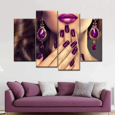 a woman's face with purple nail polish and jewels on her nails, in front of a white wall