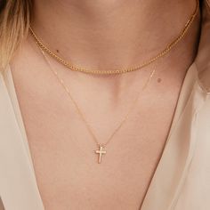 ❧ Product Overview and Key Features  Inspiring in its simplicity and elegance, this 14k Diamond Cross Necklace for Women is a perfect symbol of Christian faith. This solitaire cross pendant, made from real gold, is an exquisite Baptism gift that embodies spiritual significance. Its timeless design makes it an ideal accessory for any occasion, enhancing your style while expressing your devotion. Shop now and experience the divine beauty of this unique piece.  Material & Color Options: 14K Yellow Minimalist Cross Pendant Necklaces For Baptism, Minimalist Cross Pendant Necklace For Baptism, Minimalist Cross Jewelry For Baptism, Minimalist Cross Jewelry For First Communion, Dainty 14k Gold Jewelry For Baptism, Classic 14k Gold Jewelry For Baptism, Classic 14k Gold Jewelry For First Communion, Minimalist Gold Jewelry For Baptism, Classic Cross Necklace For Baptism